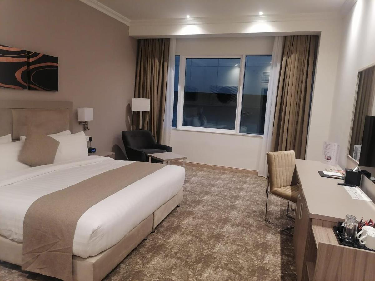 Gloria Hotel & Suites Doha Bagian luar foto
